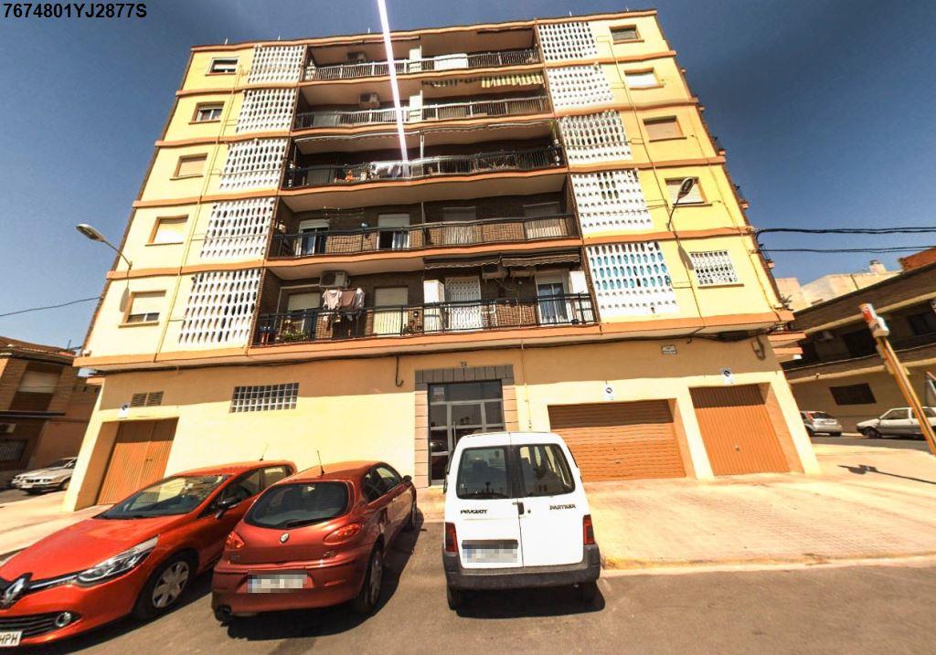 VIVIENDA én la primera planta alta, tipo E, puerta cinco del zaguán número cuatro de la